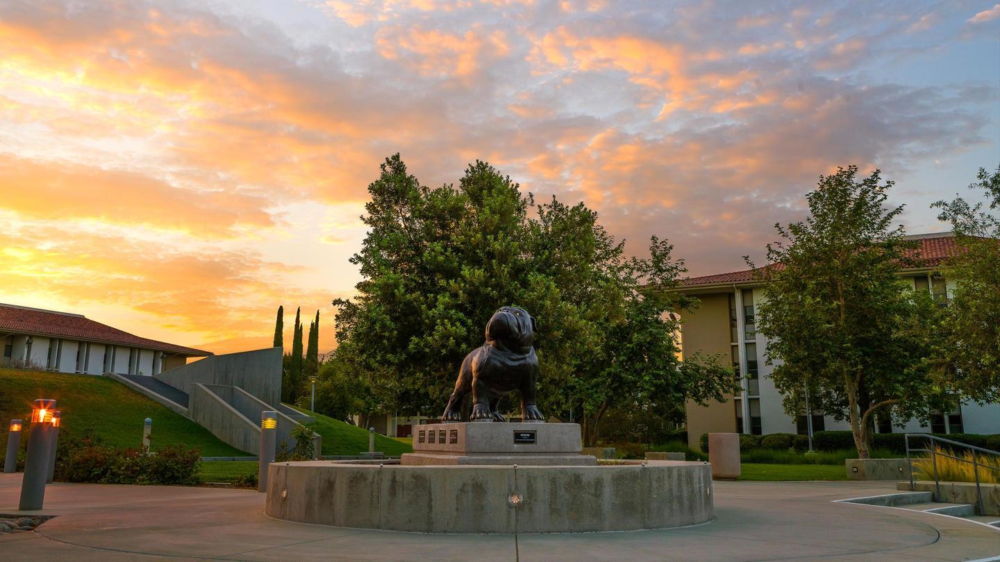 Media masthead - Bulldog statue on Redlands campus